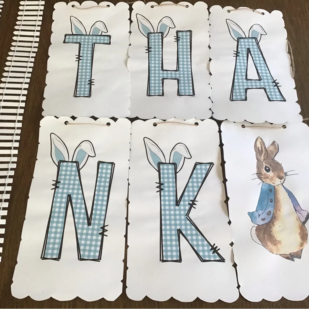 Thank you sign made with bunny ears on card paper
